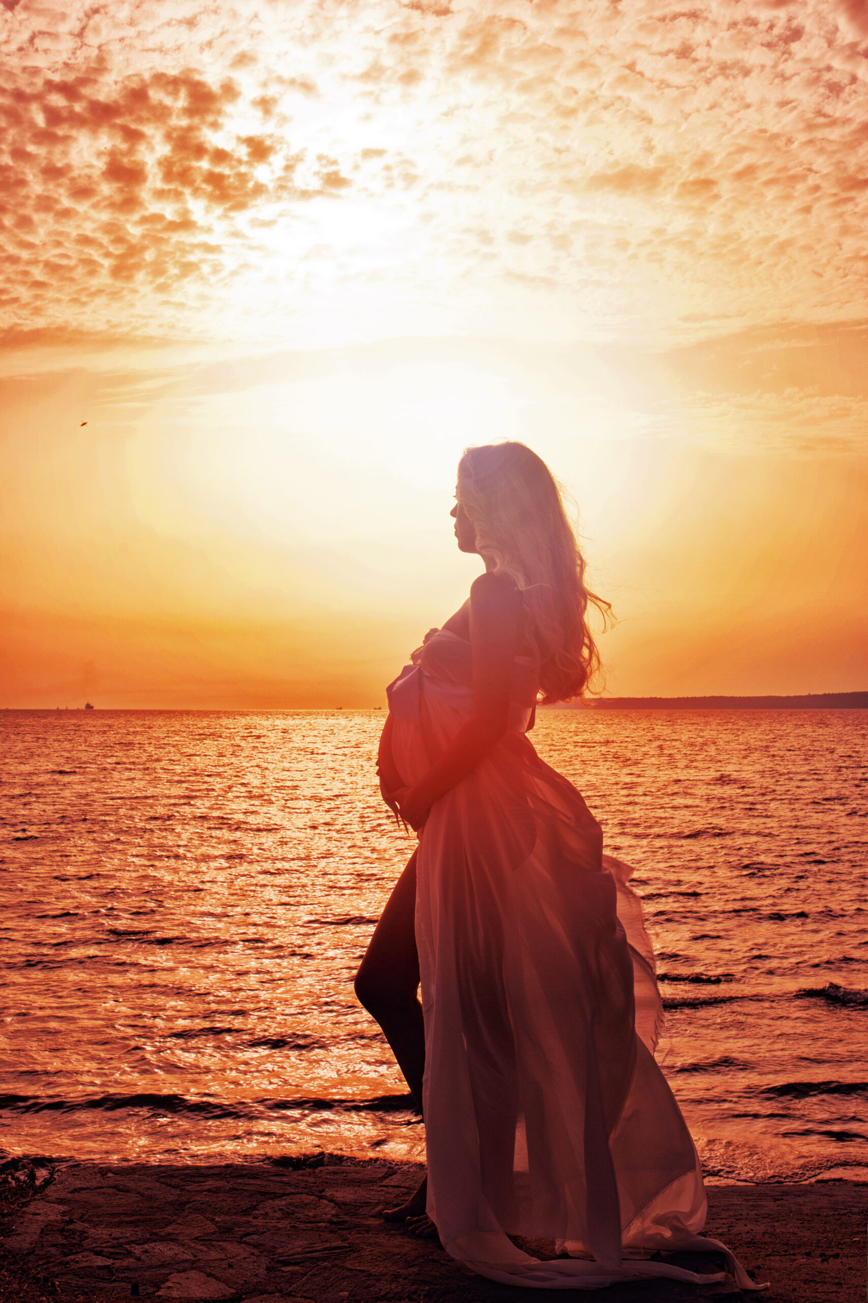 silhouette of a Pregnant Woman at Sunset