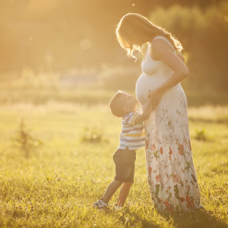 Son Looking Up at Mother