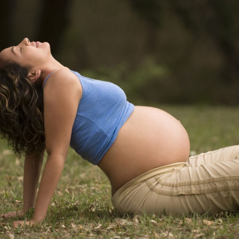 Flexible pregnant woman