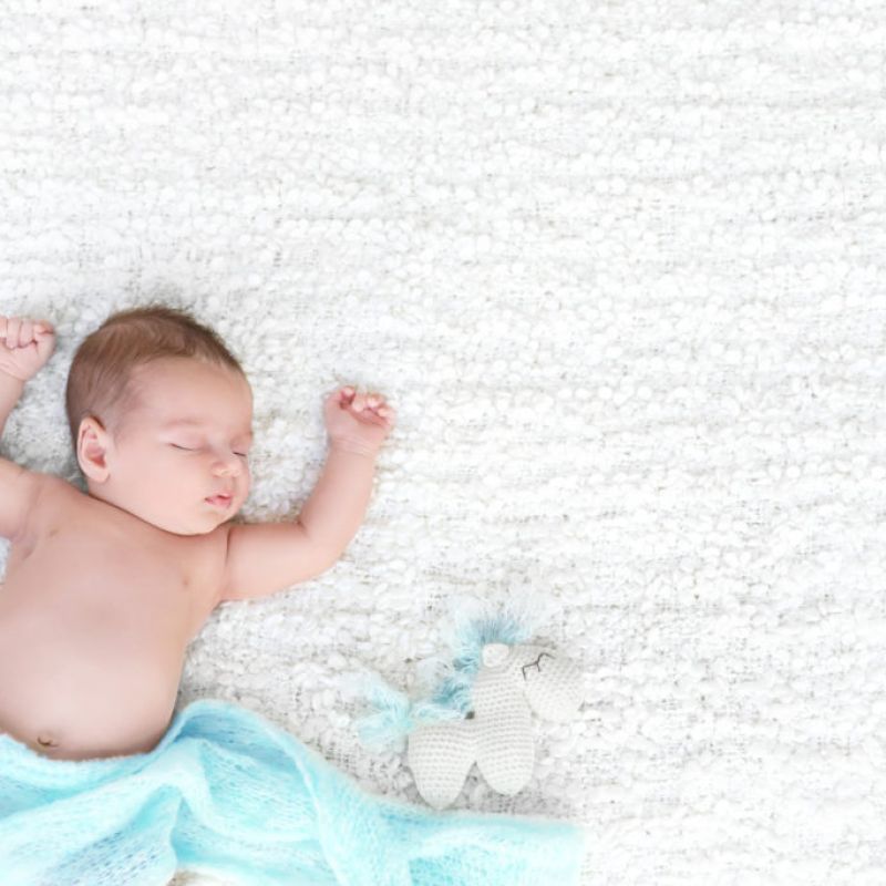 Baby Seeping on Rug
