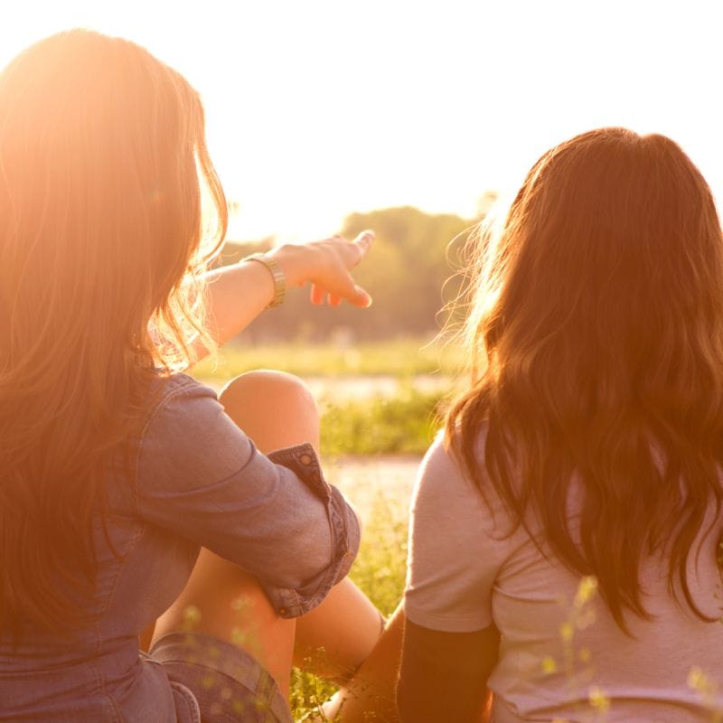 Woman with Her Daughter Enjoying the Sun