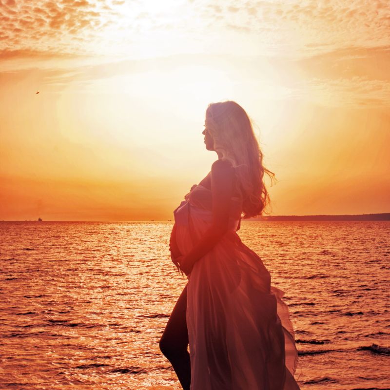 silhouette of a Pregnant Woman at Sunset